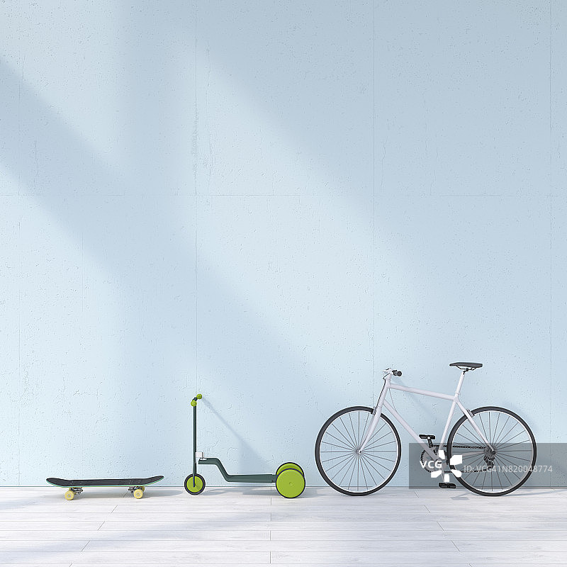 自行車、滑板、踏板車靠在墻上圖片素材