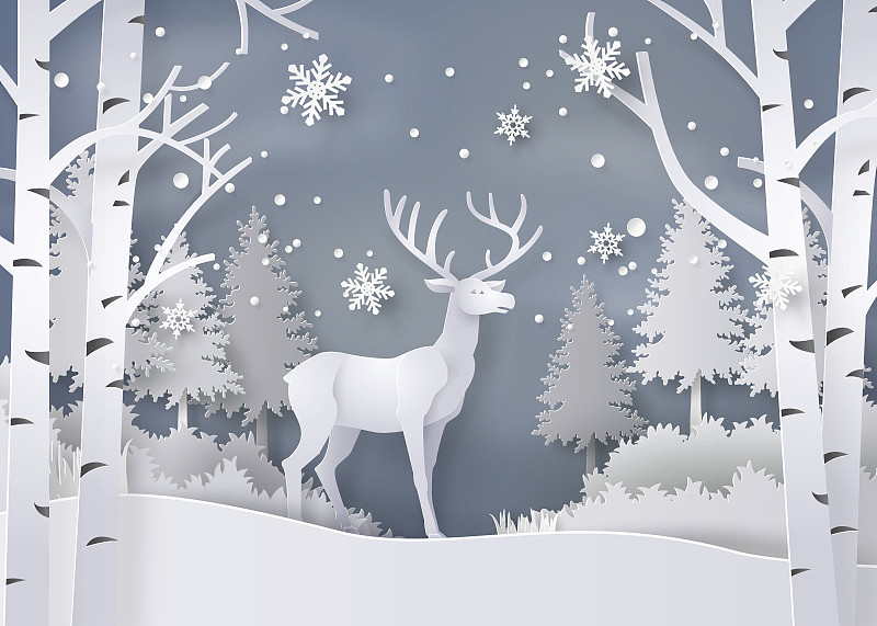 鹿在白雪覆蓋的森林里。圖片素材