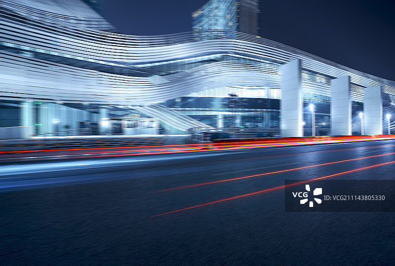 未来感地标摩天大楼和道路光轨效果图片素材