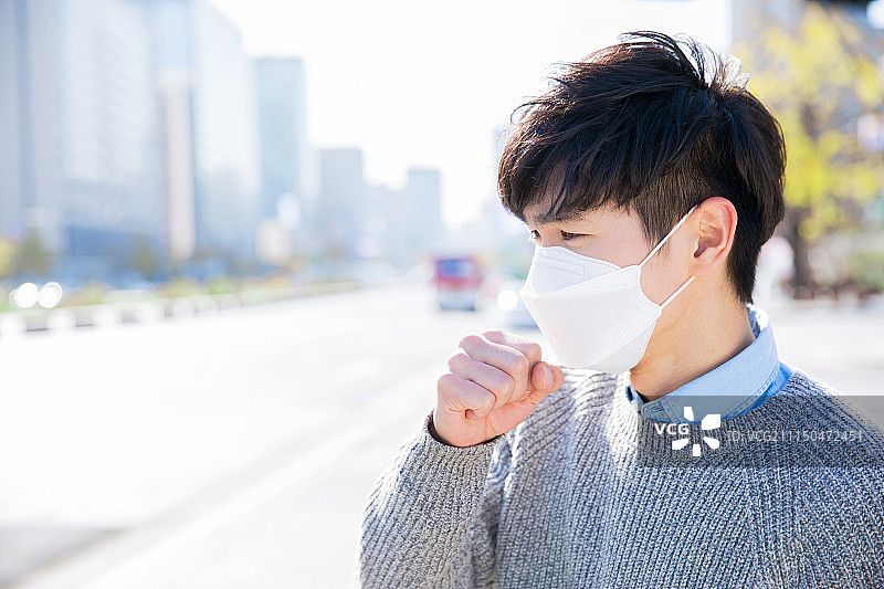 韩国，男性，烟雾(空气污染)，灰尘，寒冷，空气污染，污染(环境污染)，口罩图片素材