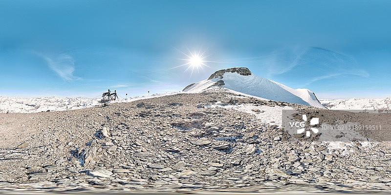 360掳 HDRI showing a rocky area in the snow covered mountains in France图片素材