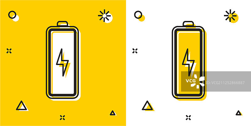 黑色电池图标隔离在黄色和白色上图片素材