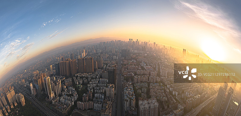 航拍城市上空的全景日出图片素材