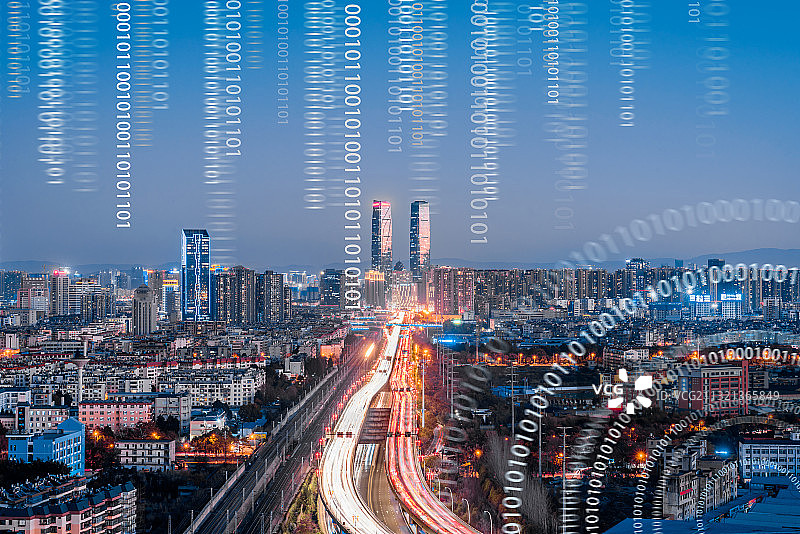 中国云南昆明双塔城市天际线夜景和城市互联大数据概念图片素材