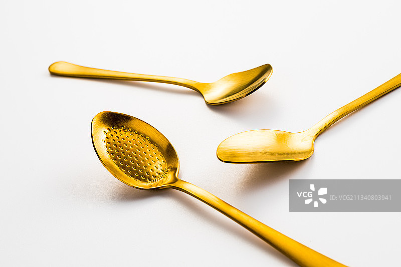 金色不锈钢甜品勺黄油刀图片素材