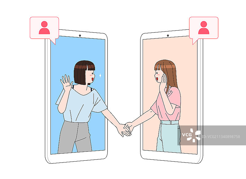 数字生活，两个来自智能手机的女人手牵手图片素材