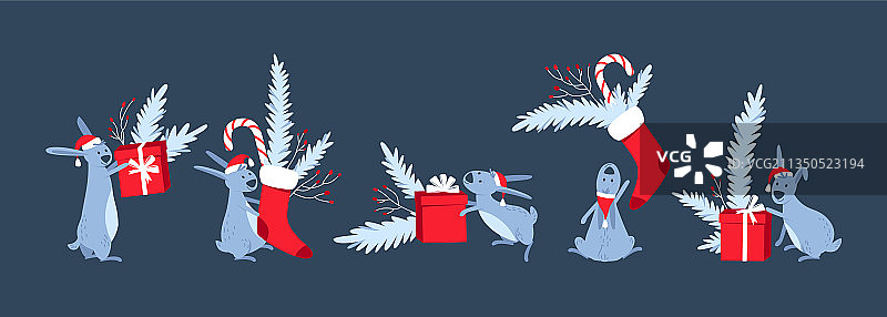 一套红色礼品盒圣诞袜子和兔子图片素材