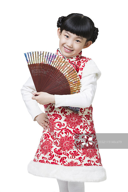 快乐的小女孩拿着一把折扇图片素材