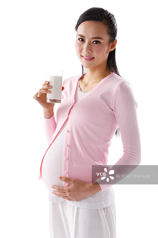 孕妇手拿牛奶杯图片素材