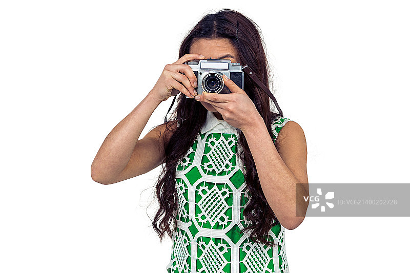 一个亚洲女人在拍照图片素材