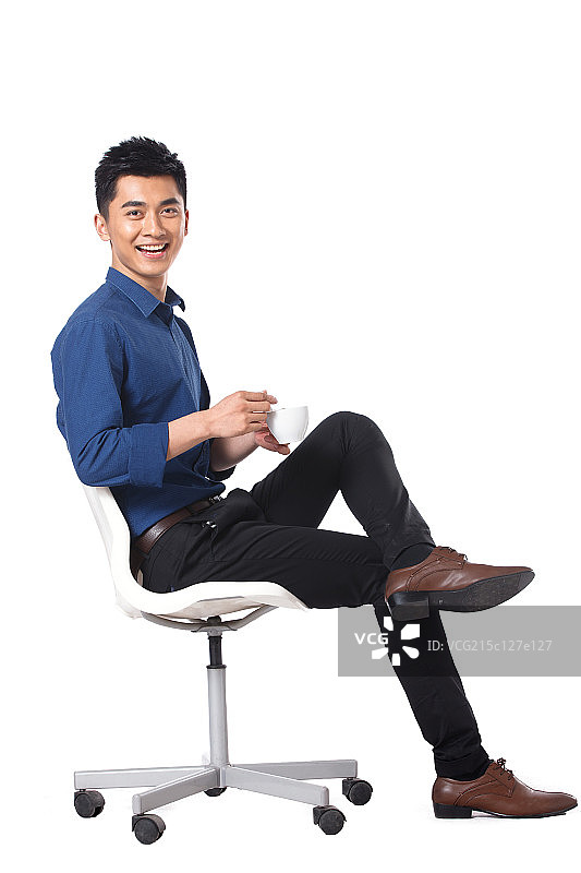 商务男士坐着喝咖啡图片素材