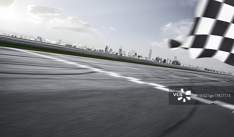 F1赛道速度特效和终点线方格旗图片素材