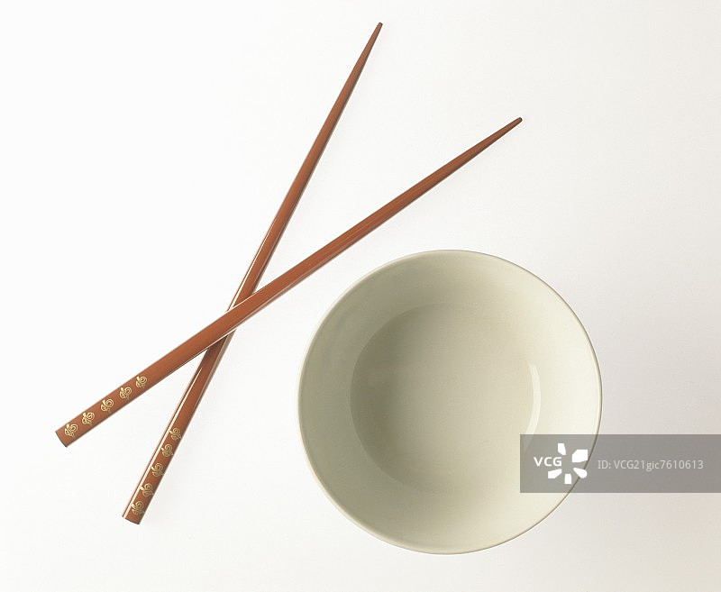 一碗米饭和两根红色筷子图片素材