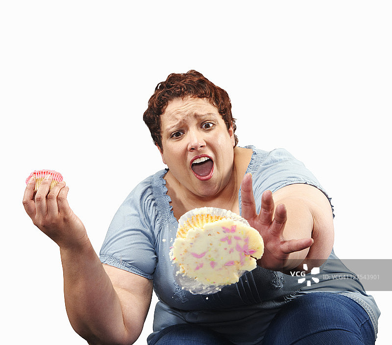 胖女人掉蛋糕图片素材