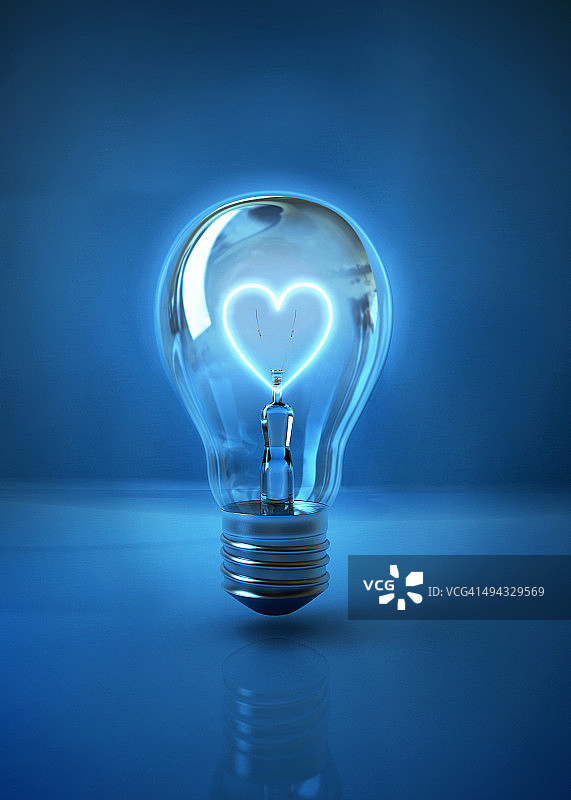 图示的心形灯丝在灯泡代表爱在蓝色的背景图片素材