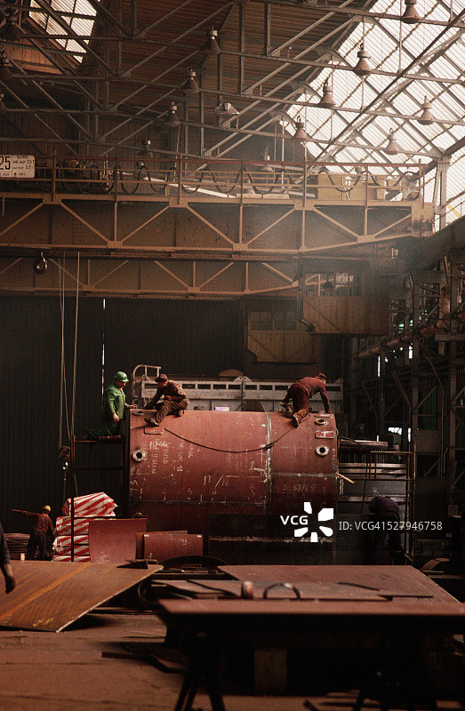 格但斯克船厂锅炉焊接工人图片素材