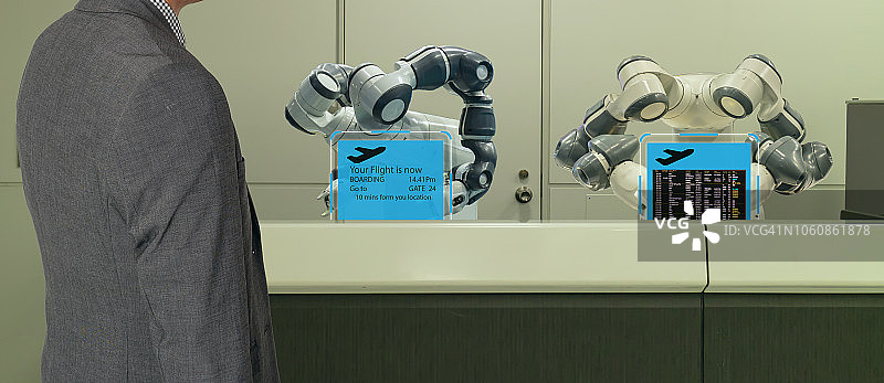 智能酒店在酒店工业4.0的概念中，前台机器人(机器人助手)在酒店大堂或机场随时欢迎客户的服务包括客房，信息提供图片素材