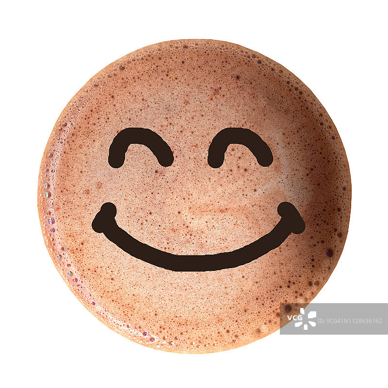 巧克力泡沫与微笑的脸孤立在白色的背景。早上好，心情好。图片素材