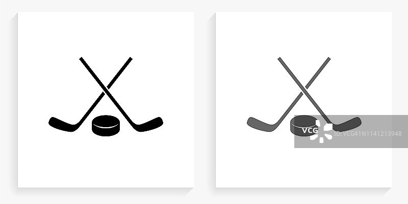 曲棍球棒和冰球黑色和白色方形图标图片素材