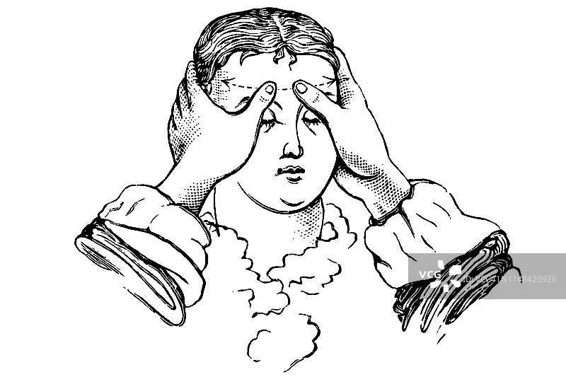 偏头痛患者用双拇指平放按摩头部图片素材