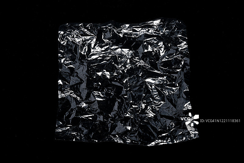 透明闪亮的塑料箔上的黑色图片素材