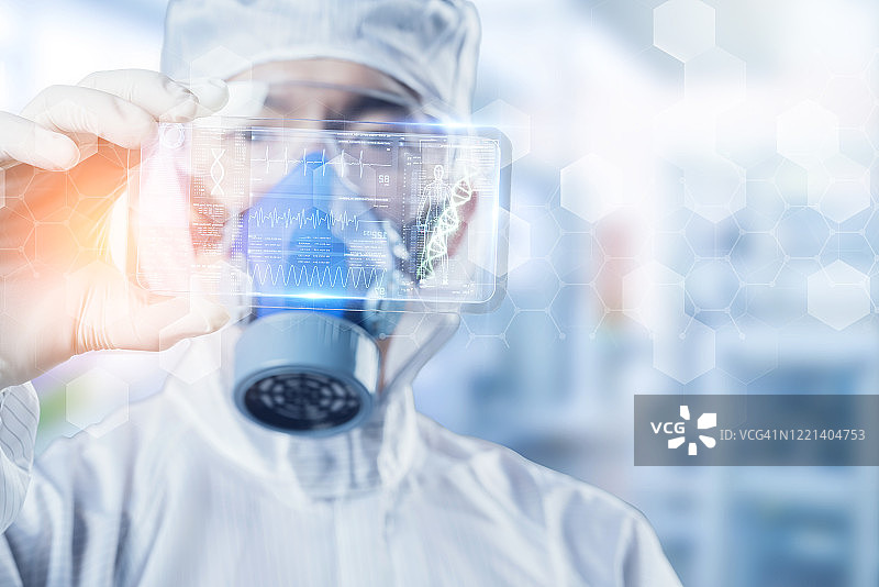 科学家医生用口罩和防护服技术检测病毒感染三维未来虚拟现实全息图实验室测试，新冠病毒智能数字医疗保健技术。图片素材