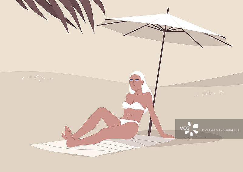 年轻女子坐在沙滩上撑伞，夏日度假，炎热的热带气候图片素材
