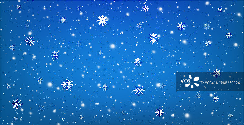 雪白的蓝色背景和飘落的雪花。圣诞节冬天的雪花飘落着雪白的雪花。图片素材