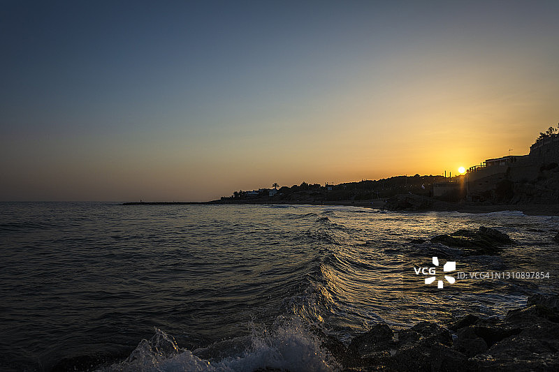 日落在海上景观，巴塞罗那-西班牙图片素材