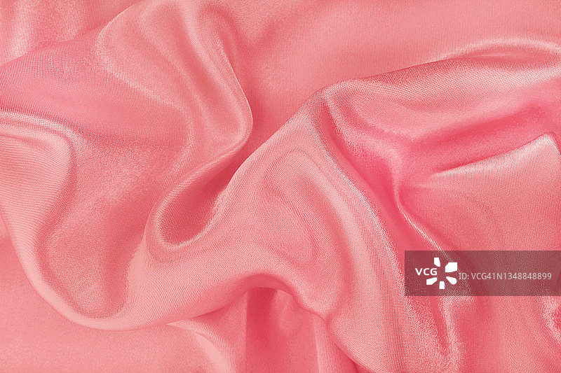 玫瑰金织物质地背景，丝质或亚麻布图案细节。图片素材