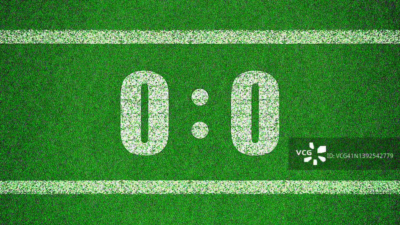 足球比分0时。绿色的草地上画着白色的数字0和0图片素材