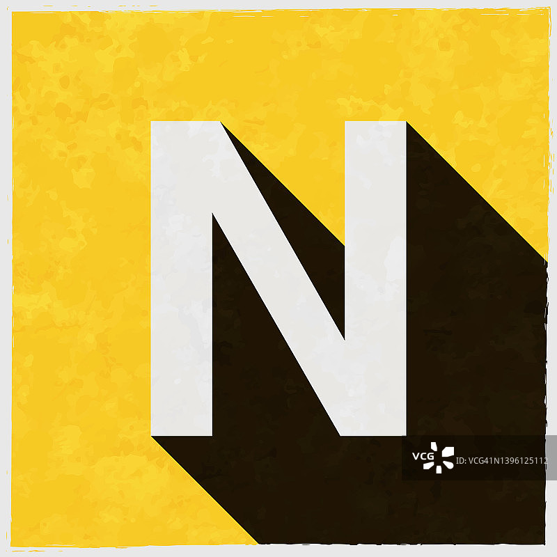 字母n图标与长阴影的纹理黄色背景图片素材