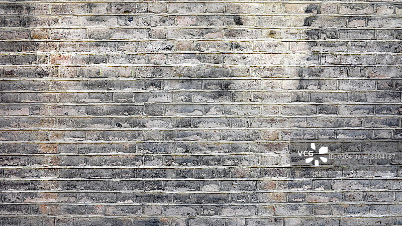 空的风化砖墙在灰色和白色的色调在伦敦，英国，英国图片素材