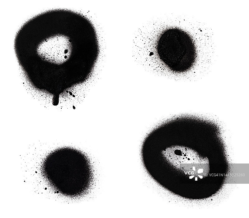 特写的两个黑色喷漆点和圆圈与飞溅和滴，孤立在白色背景。图片素材