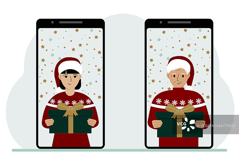 一名女子和一名男子通过手机视频会议在网上见面，虚拟讨论圣诞和新年假期和礼物。图片素材