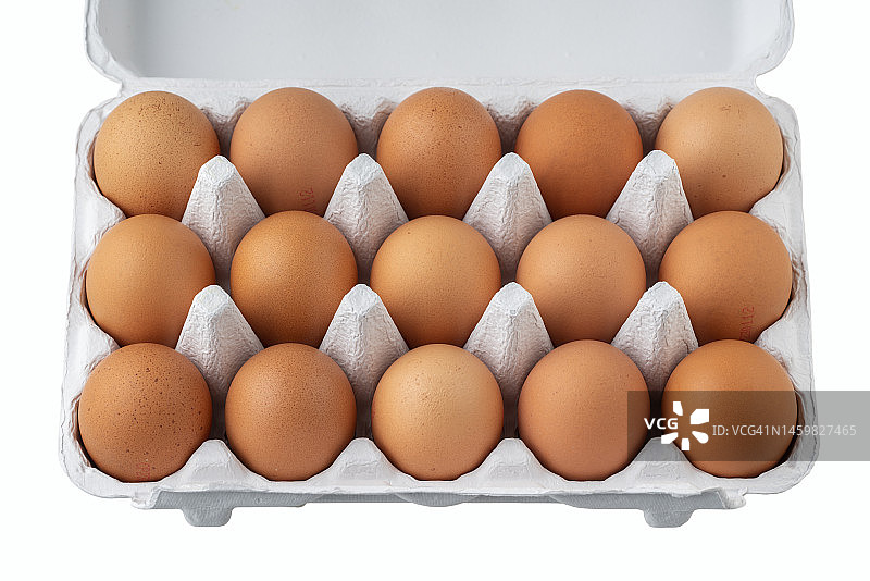 鸡蛋盘上放棕色的鸡蛋图片素材