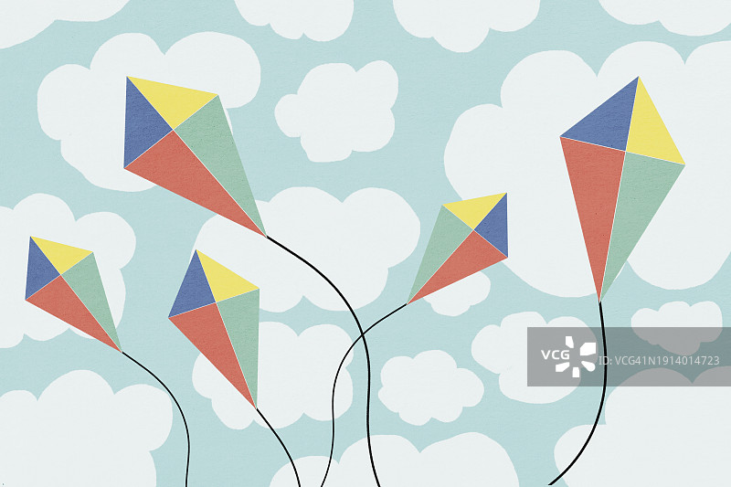 五颜六色的风筝在多云的天空中飞翔图片素材