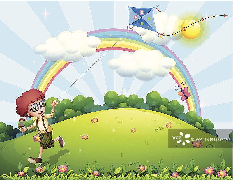 男孩和他的风筝在山顶与彩虹图片素材