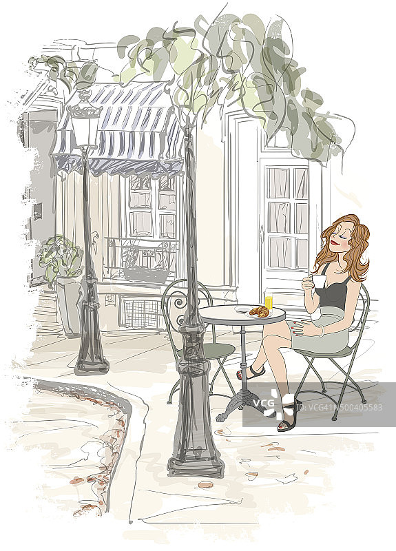 巴黎的蒙马特——假日里吃早餐的女人图片素材