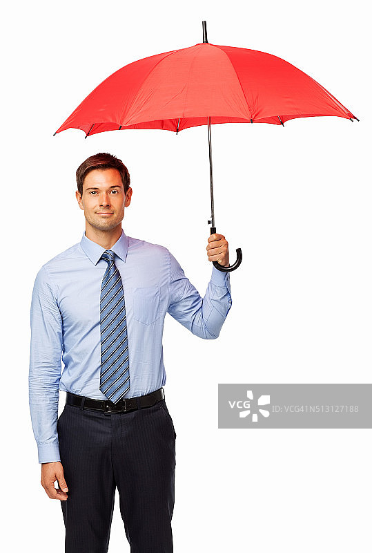自信的商人拿着红伞图片素材