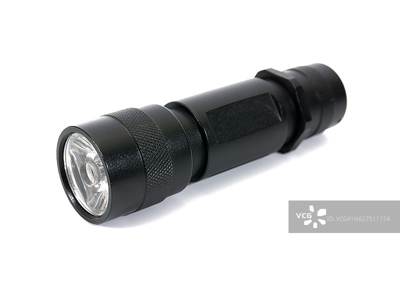 黑色LED手电筒孤立在白色背景。手电筒孤立图片素材