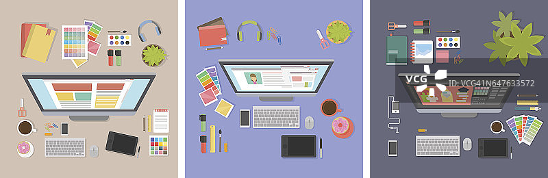 设计师办公桌模型集。有电脑屏幕、写字板和绘图工具的书桌。图片素材