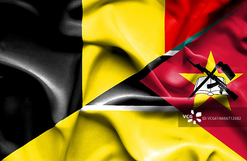 挥舞着莫桑比克和比利时的旗帜图片素材