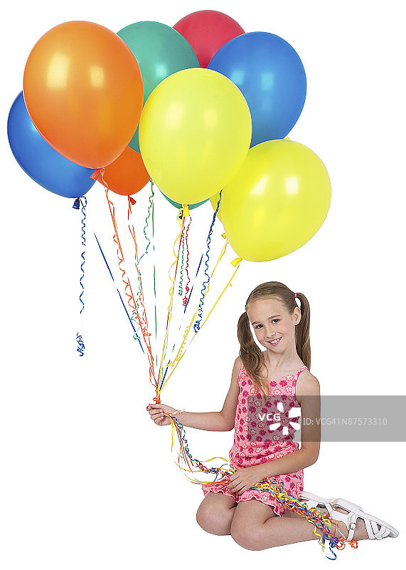 拿着气球的女孩图片素材