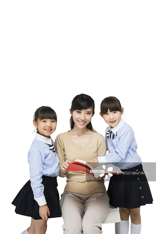 女教师和小朋友一起读书图片素材