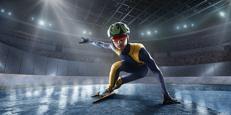 男子短道运动员滑在专业冰场图片下载