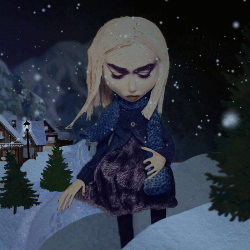 在雪夜，穿着和头发在风中飘动的木偶形象，定格动作效果图片下载