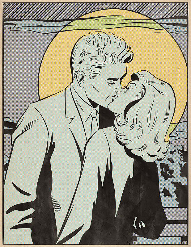 一对年轻的情侣在月光下接吻图片素材