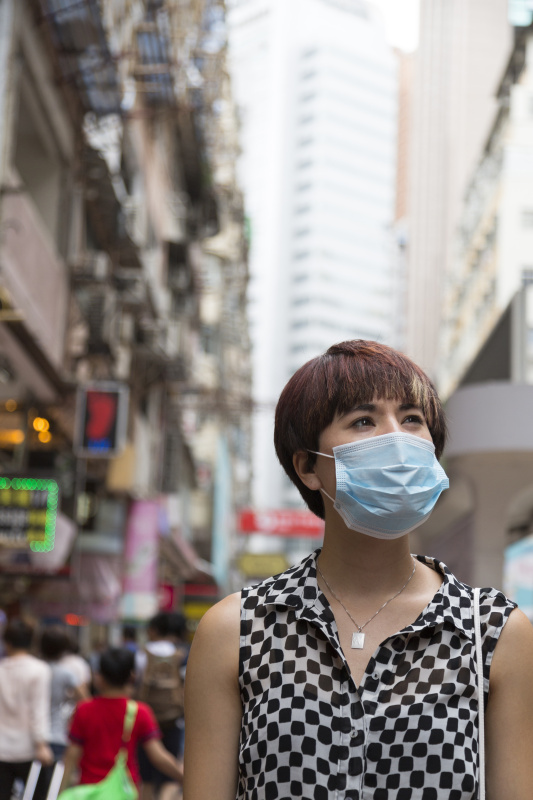 香港戴口罩的妇女图片素材