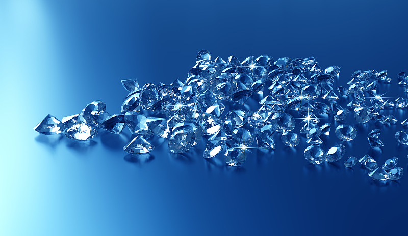 蓝色背景上的钻石图片下载